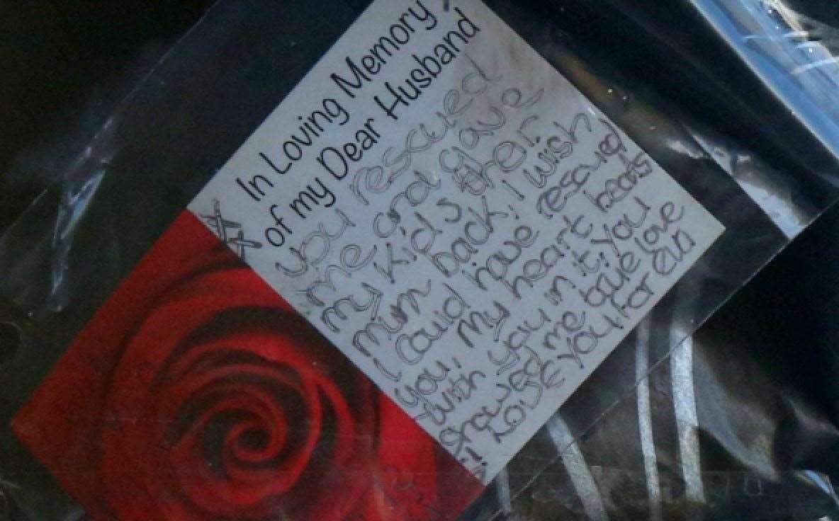 A floral tribute left at the scene of the killing in Fox Street, Gillingham Picture: UKNIP