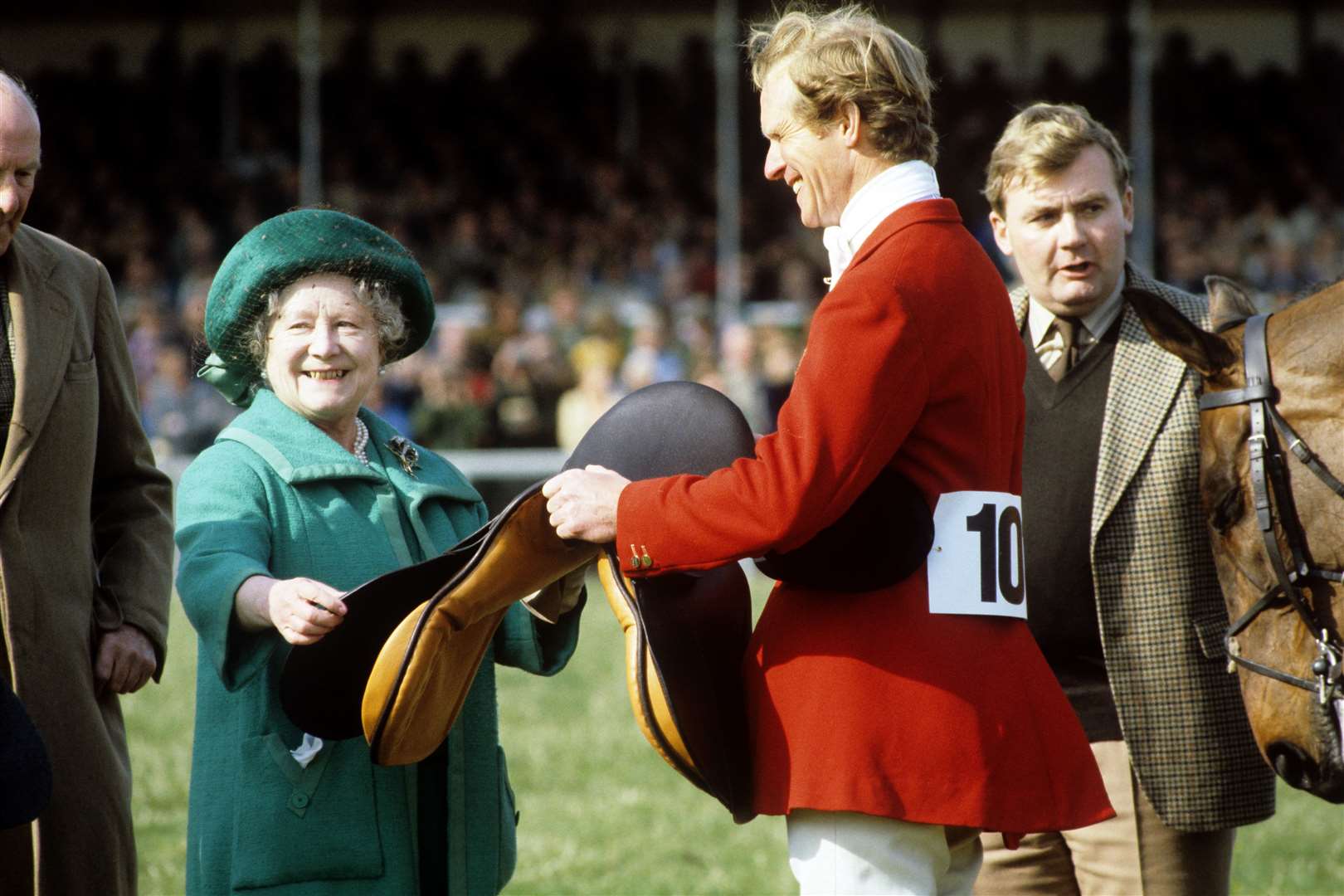 Richard Meade, pictured with the Queen Mother in 1982, had a glittering equestrian career, winning Olympic golds as well as the Badminton Horse Trials (PA)