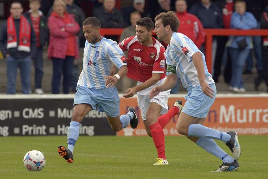 Folkestone Invicta (blue and white) do battle with Ebbsfleet in the FA Cup