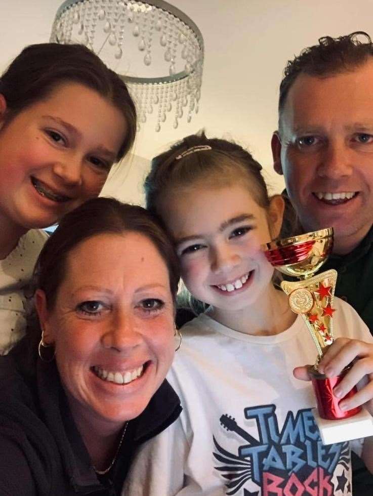 Brooke celebrated her victory with her mum, dad and sister Picture: Mark Cressey