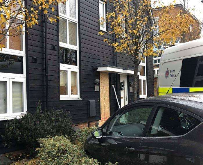 The door of a house is boarded-up (5849732)