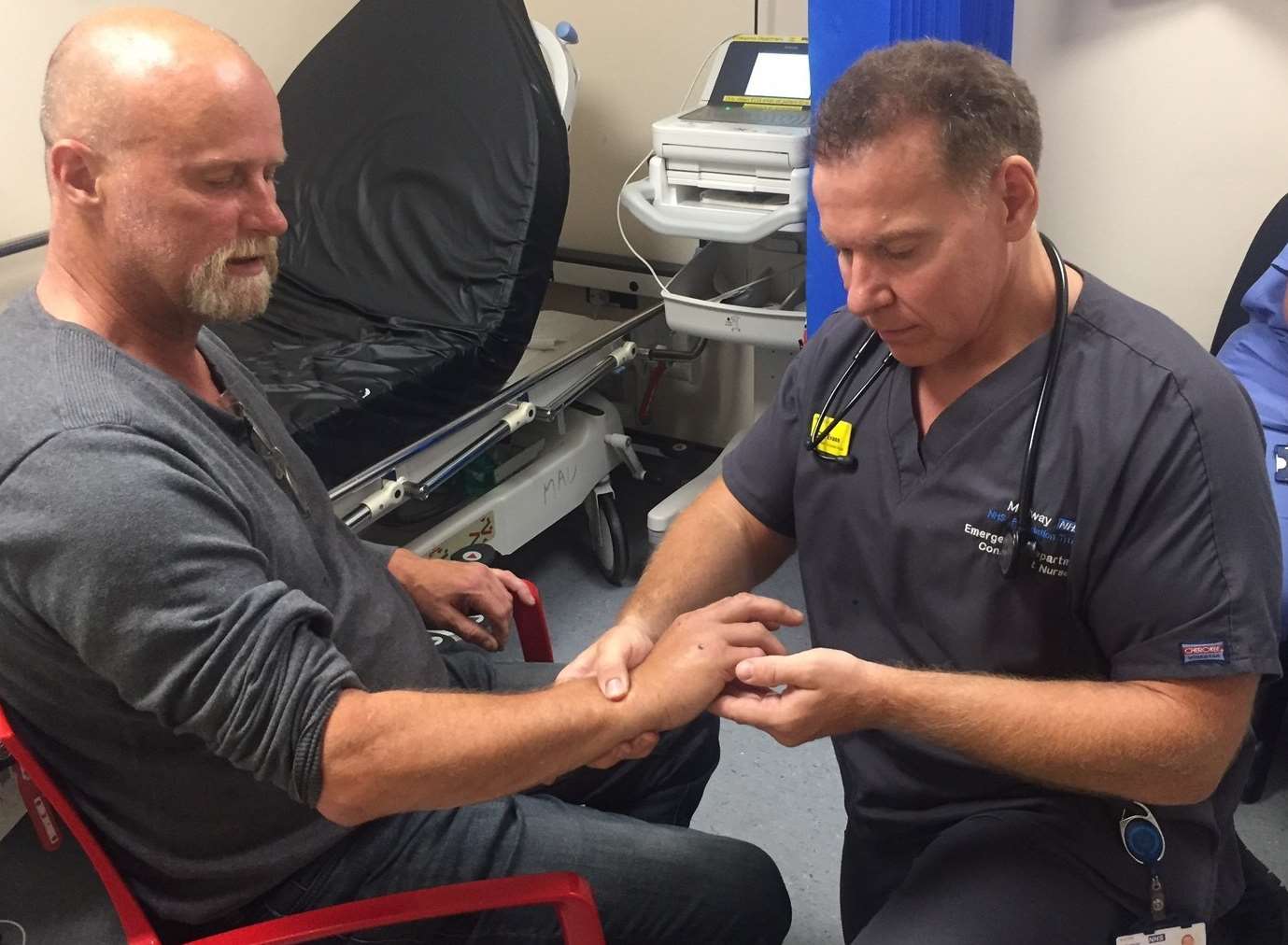 Cliff Evans, right, at work at Medway Maritime Hospital