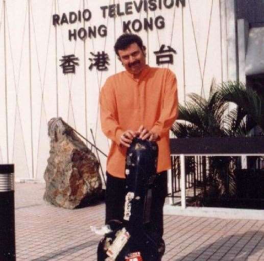 Doug and guitar in Hong Kong