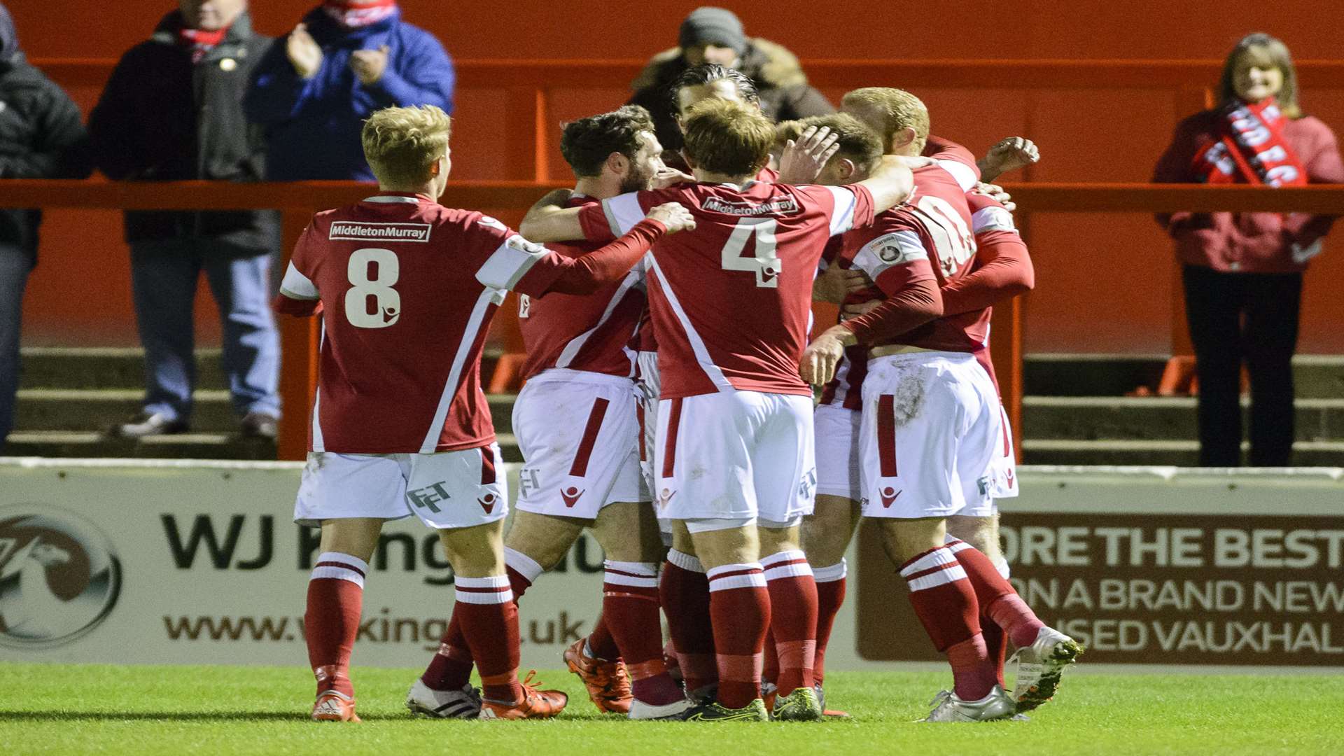 Matt Godden is congratulated by his team-mates after completing a hat-trick Picture: Andy Payton