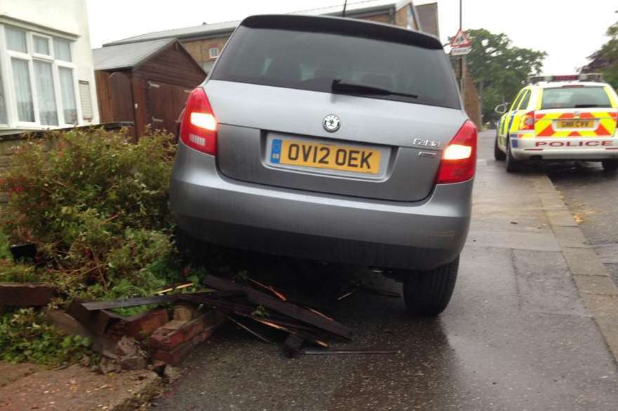 A police car at the scene of the crashed car in Rochester