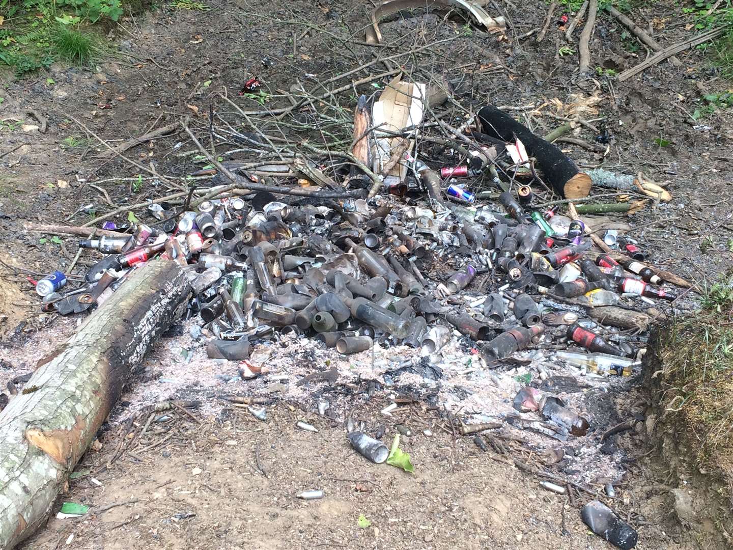 Charred debris was left at the site as residents were left disgusted by the mess and the gathering taking place