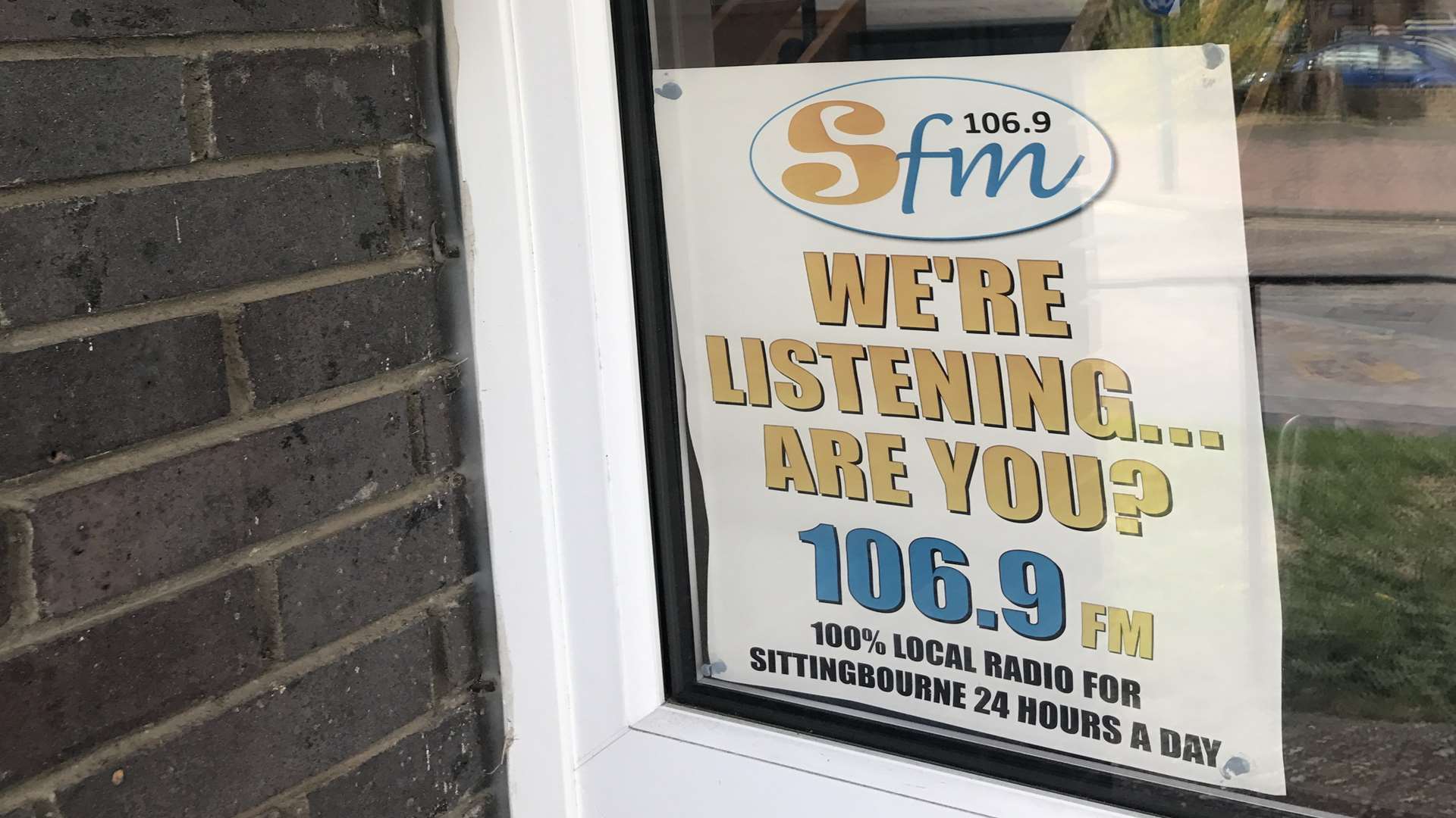 Signs displayed in the windows of Crescent Hall