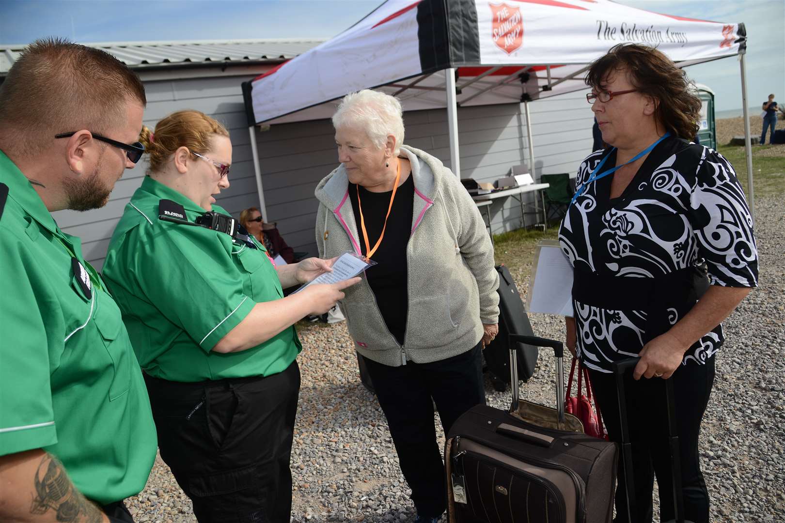 Volunteers had been asked to bring suitcases to make the demo as realistic as possible. Picture: Gary Browne