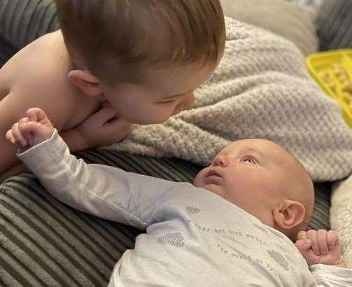 Arthur-James with newborn Leyton