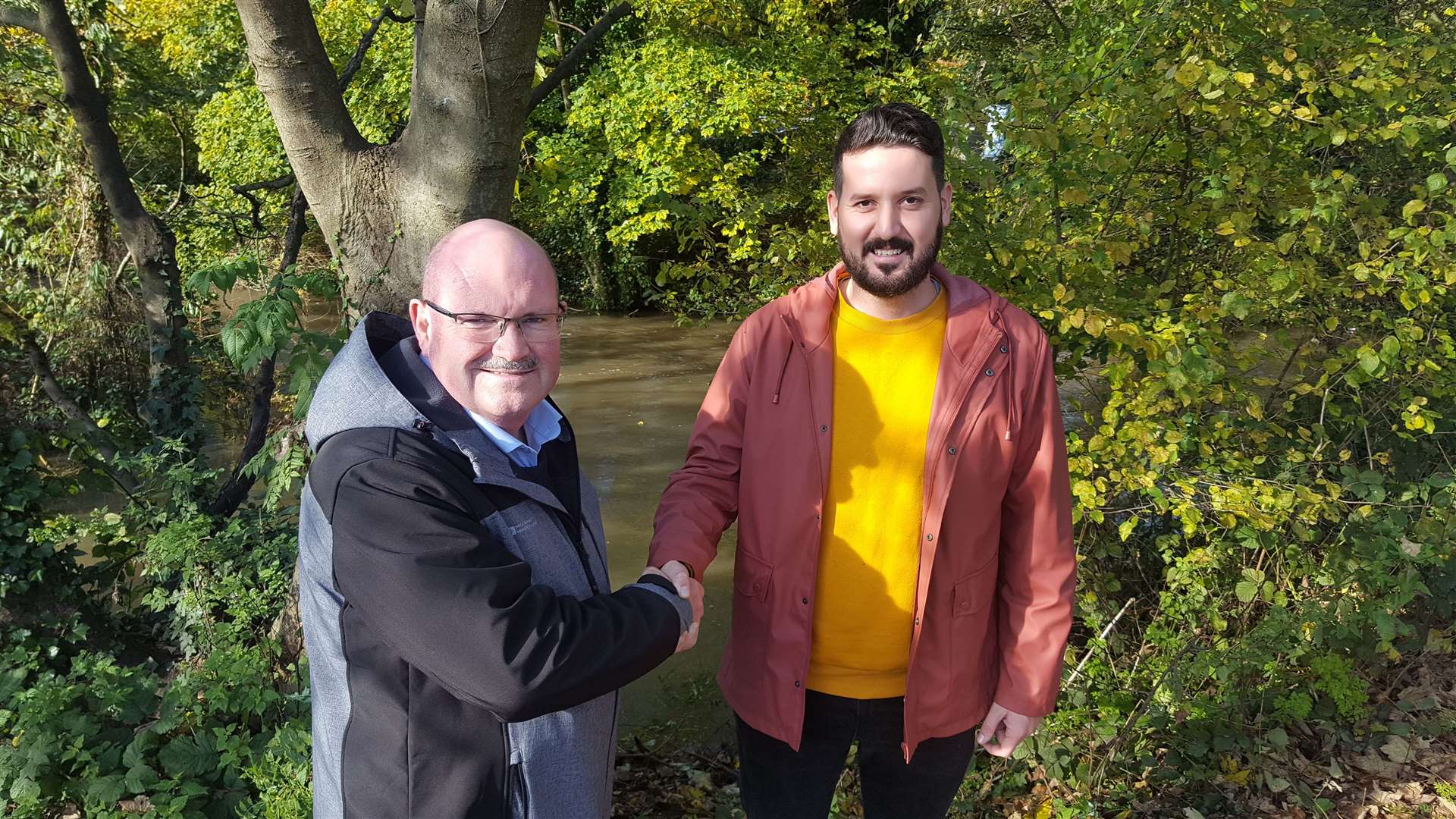 Alex Giles (right) is thanked at the scene of the drama by Chris Sands (21464533)