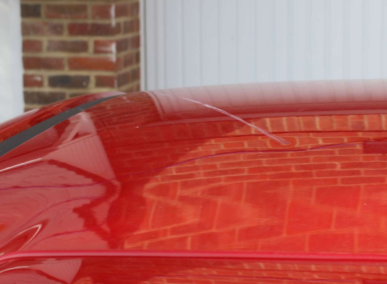 Damaged: scratched roof of car. File image