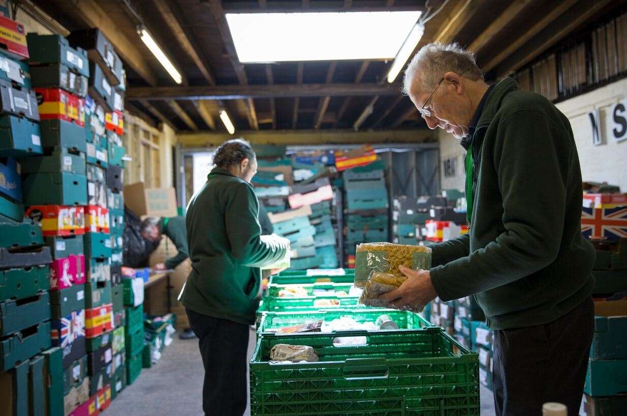 Volunteers unload supplies at a Trussell Trust food bank