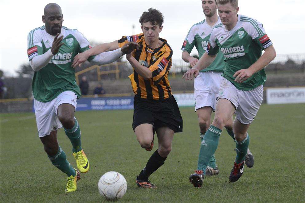 Johan Ter Horst dribbles away from three defenders Picture: Gary Browne