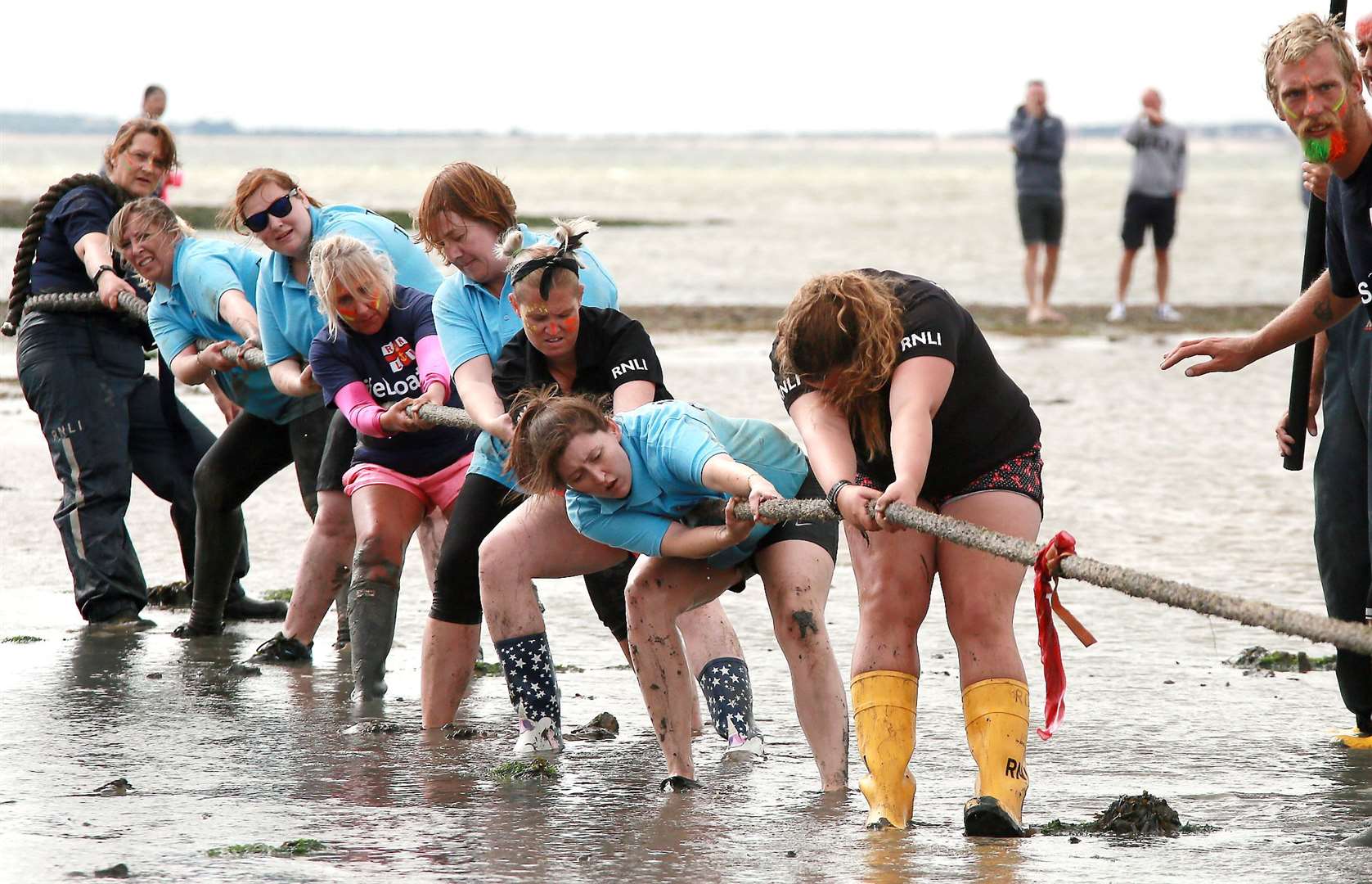 People taking part in the 'mud tug' at last year's festival