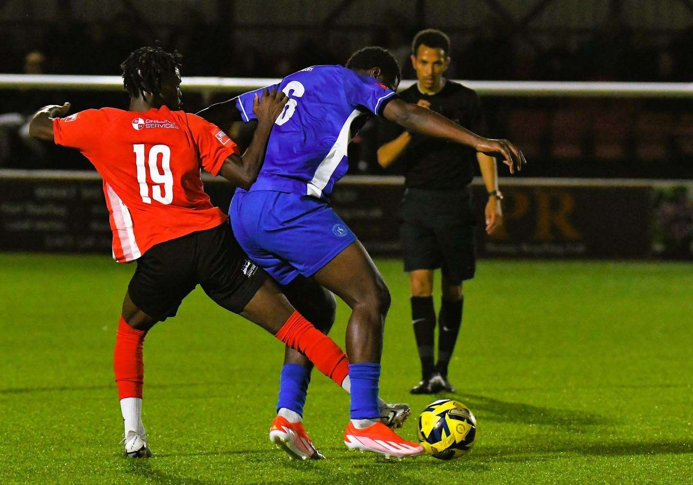 Sheppey's Victor Aiye up against Herne Bay midfielder Mo Kamara. Picture: Marc Richards