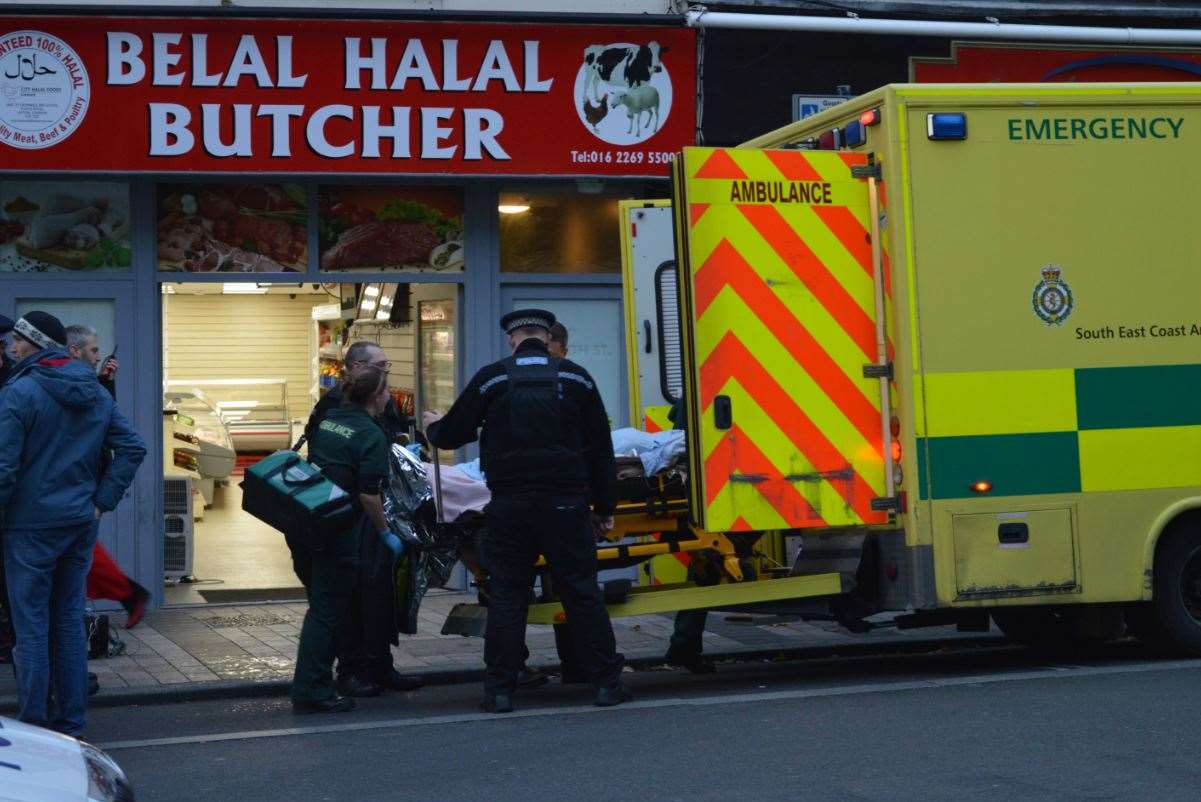 Paramedics load the man into the back of an ambulance parked at the bottom of High Street, Maidstone