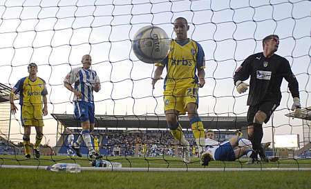 Curtis Weston scores Gillingham's goal against Colchester