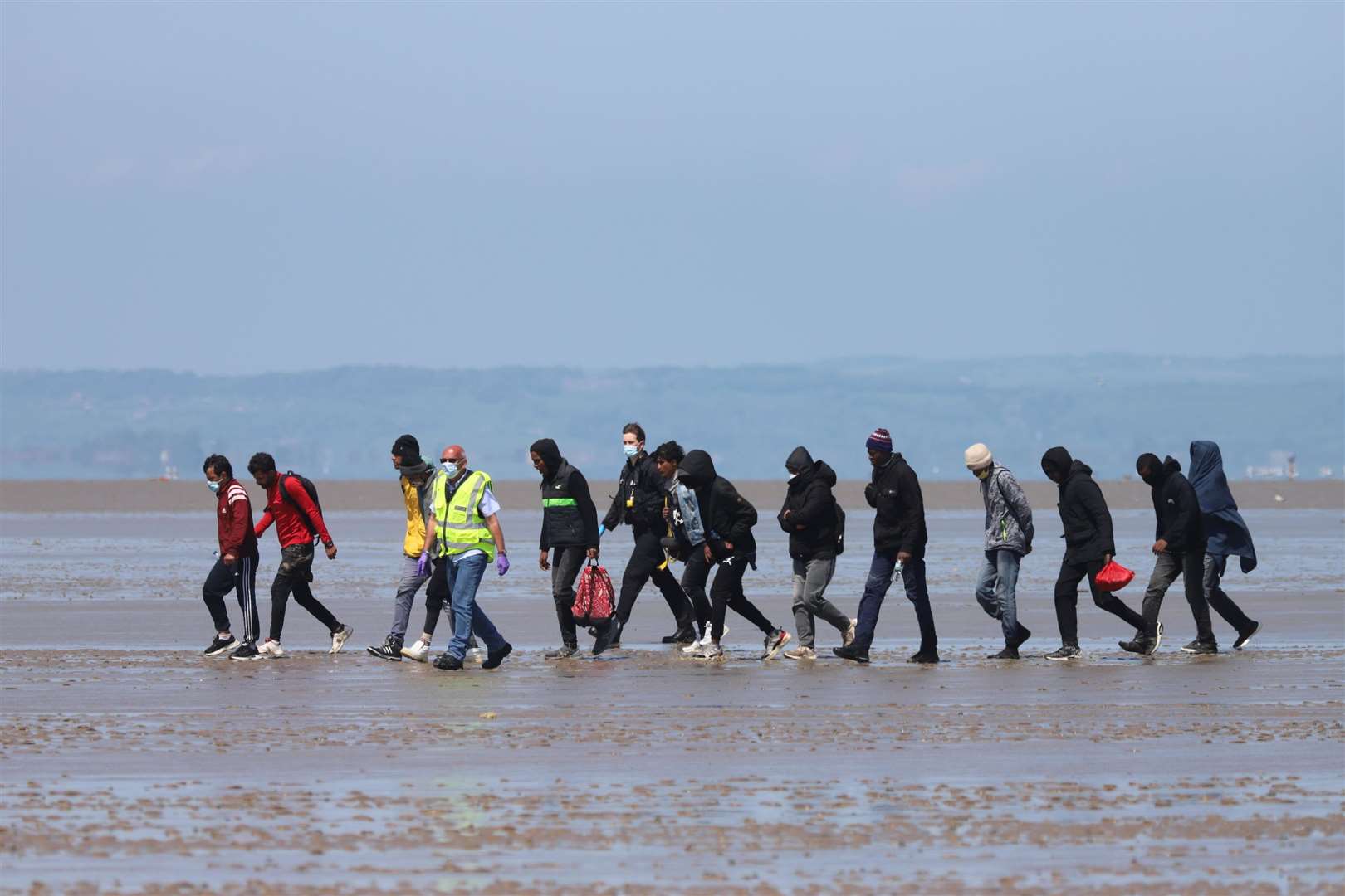 Some asylum seekers have landed by themselves on the Kent coast, such as here in Romney Marsh in 2021. Submitted picture