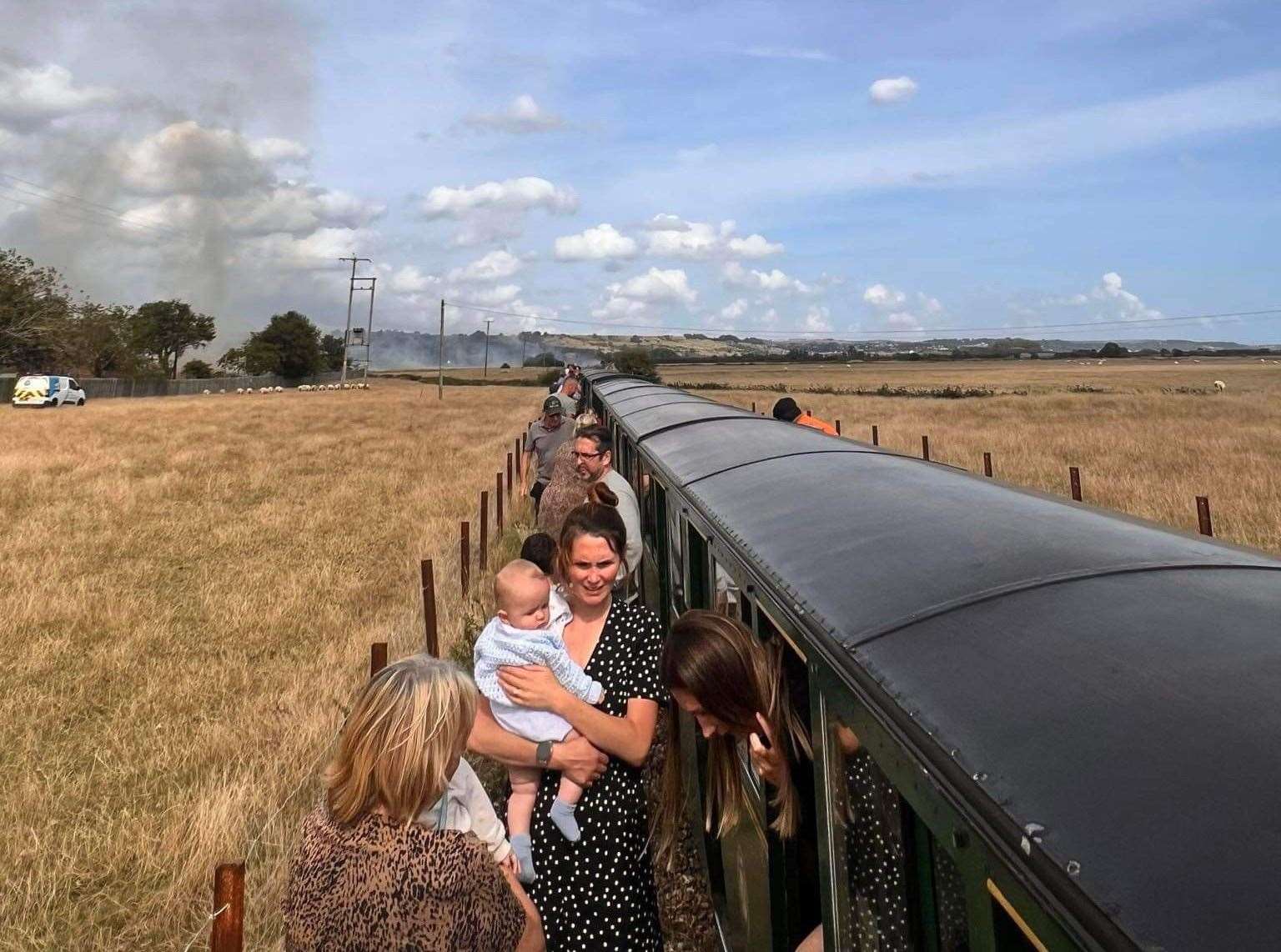 The train was held for 30 minutes while emergency crews were called to the scene. Picture: Stuart Jaenicke