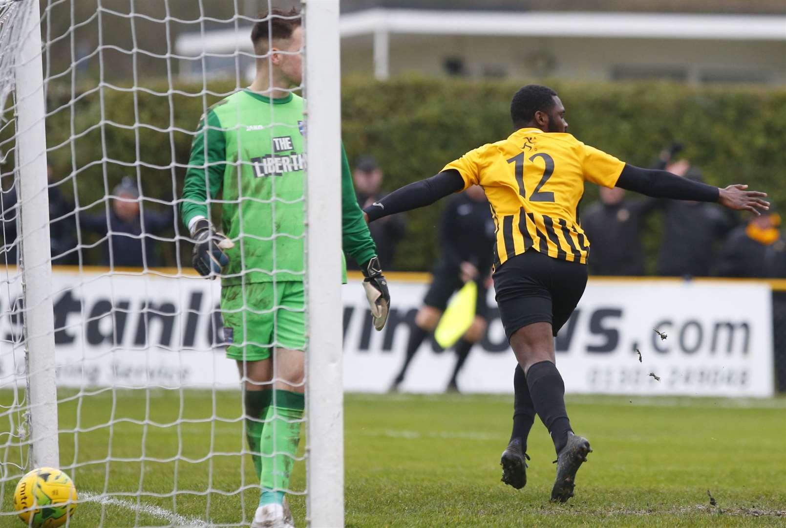 Folkestone's Chinedu McKenzie celebrates scoring Invicta's third goal against Margate Picture: Andy Jones