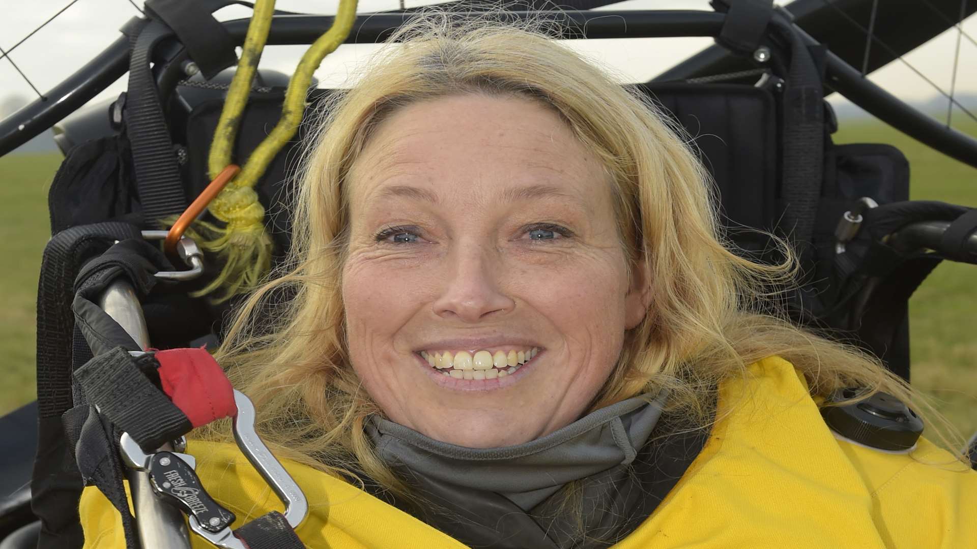 Sacha Dench, paramotorist flying save swans.