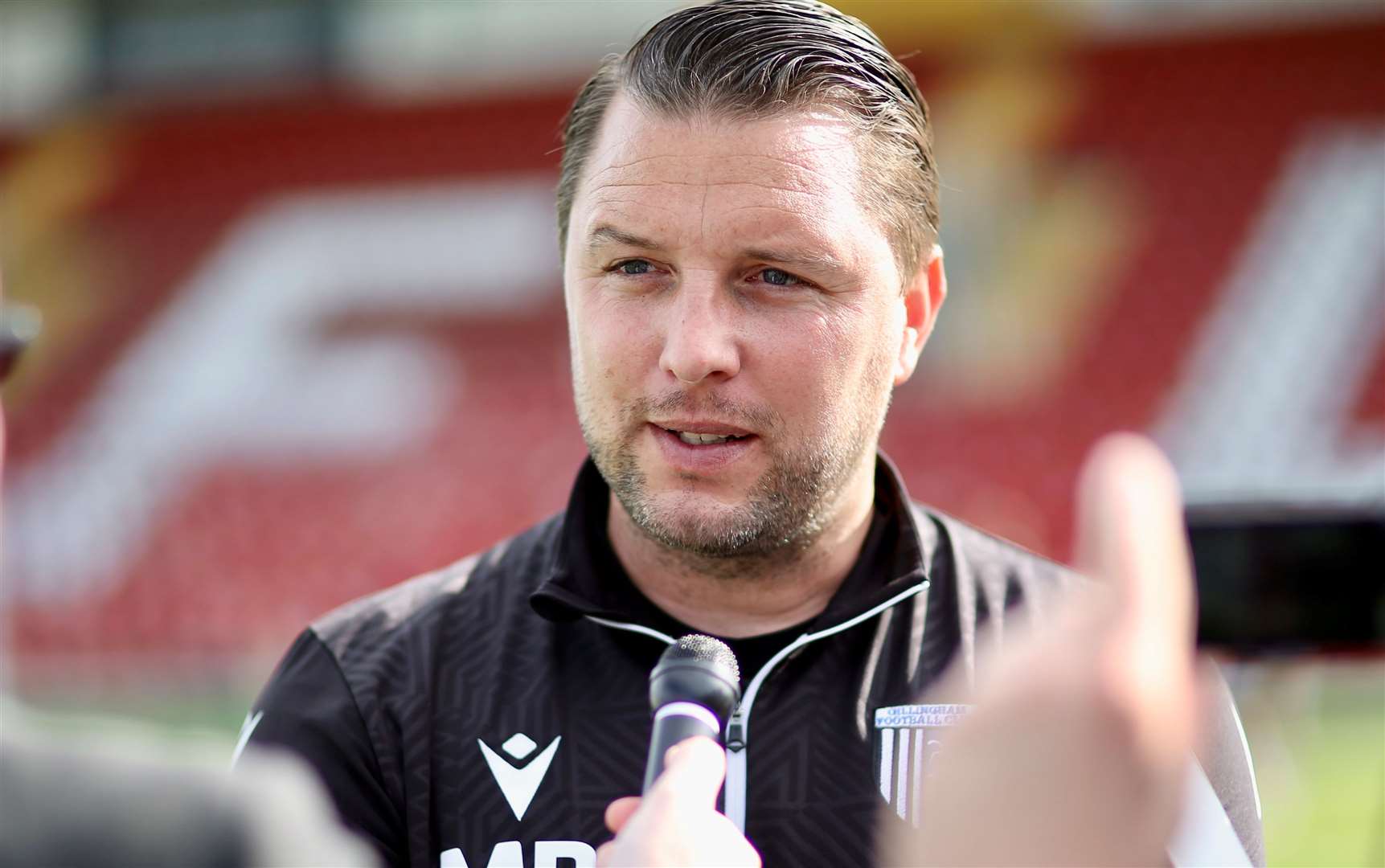 Mark Bonner speaks to the press after Gillingham’s final pre-season game, at Woking Picture: @KPI_Julian