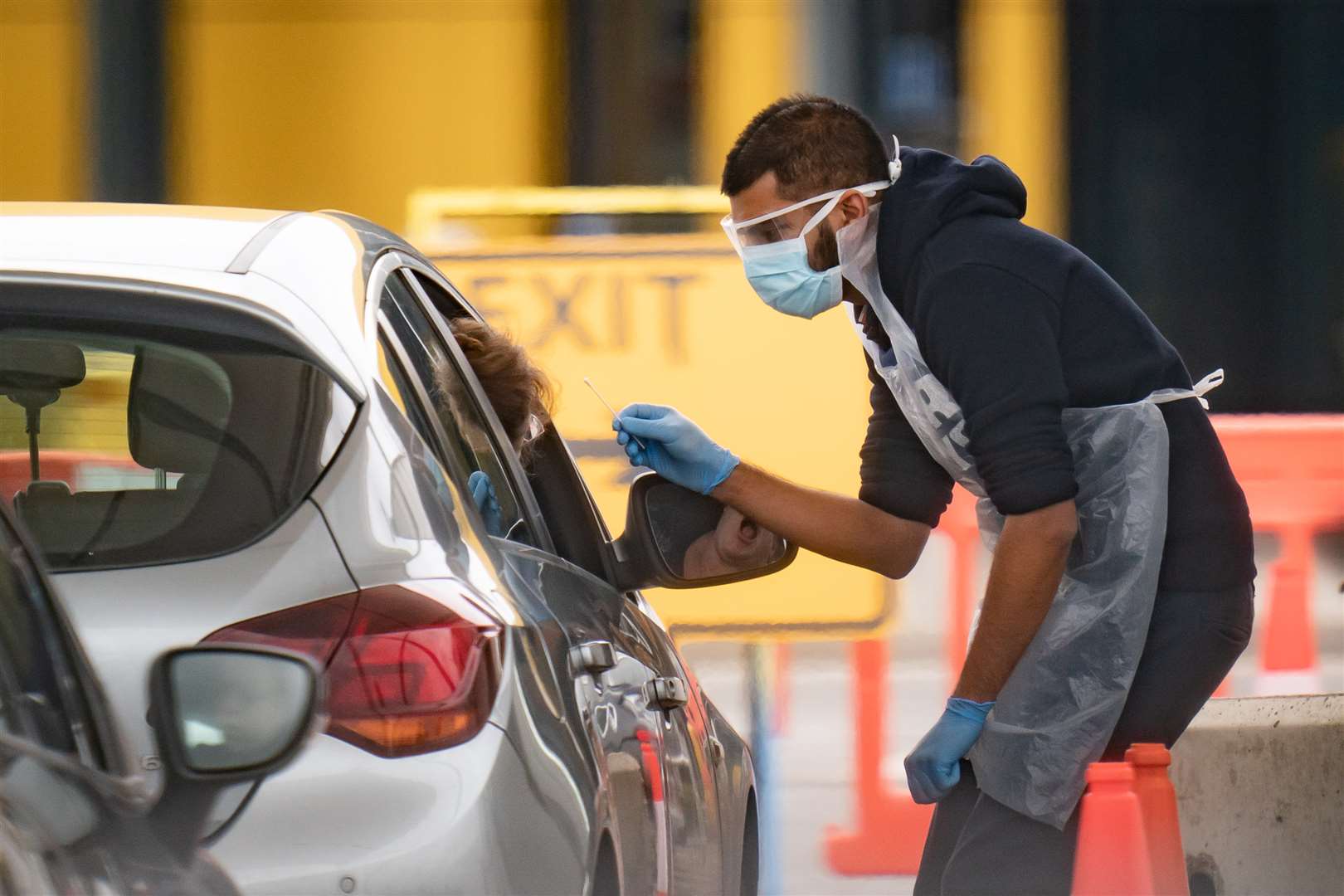 Some NHS staff are already being tested for the virus at drive-through assessment sites (Aaron Chown/PA)