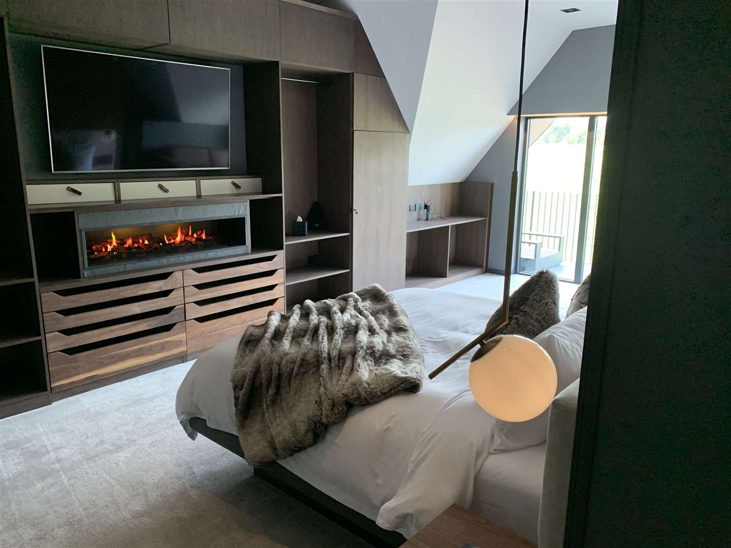 A bedroom in the £895-a-night penthouse at The Cave