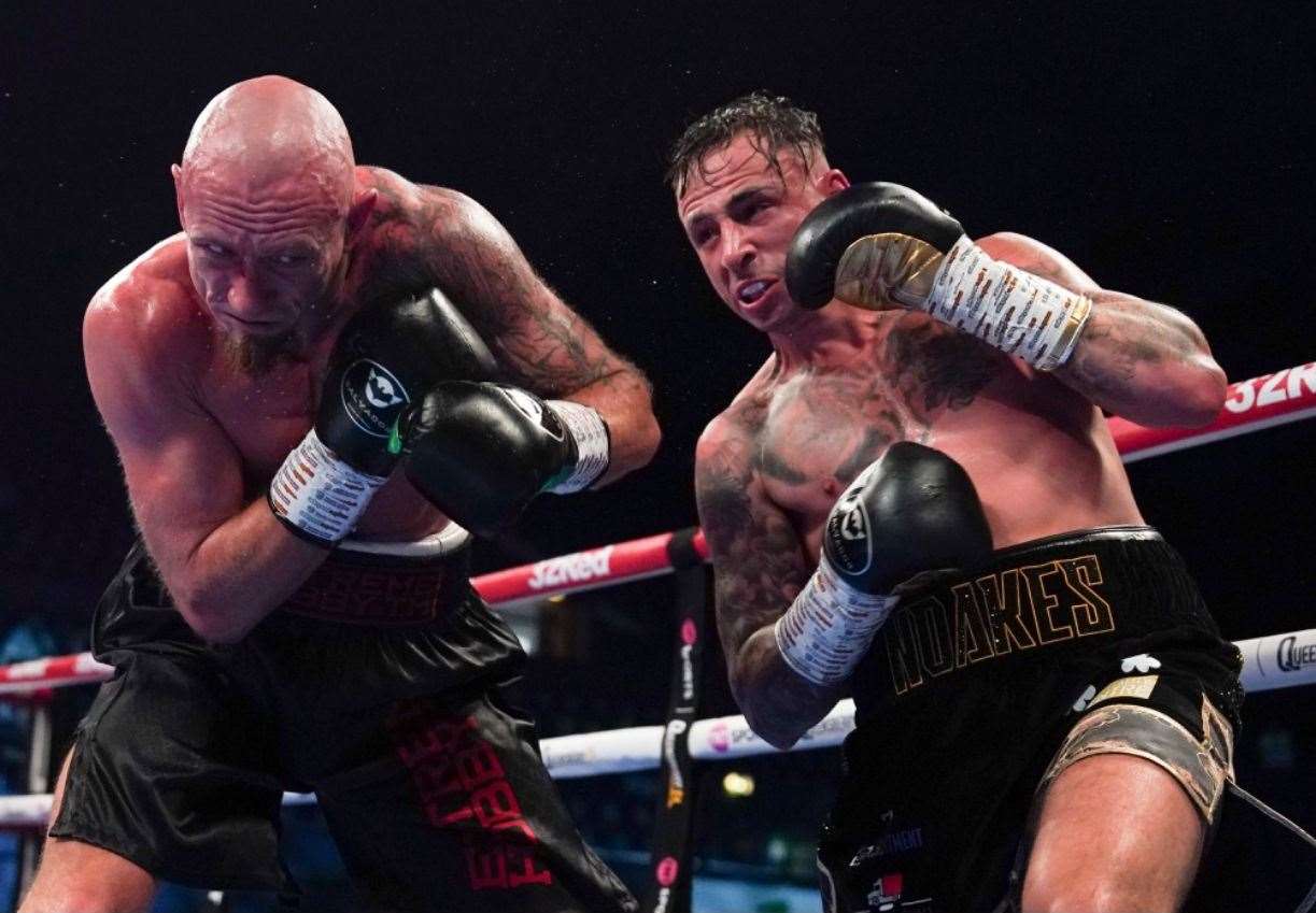 Sean Noakes, right, gets to work against Lukasz Barabasz at Wembley Arena. Picture: Queensberry Promotions