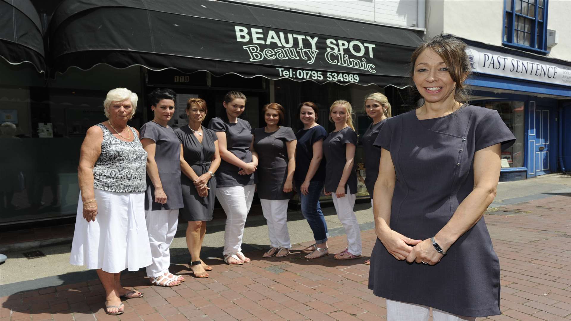 Trina Chalmers-Taylor pictured with her staff before the fire