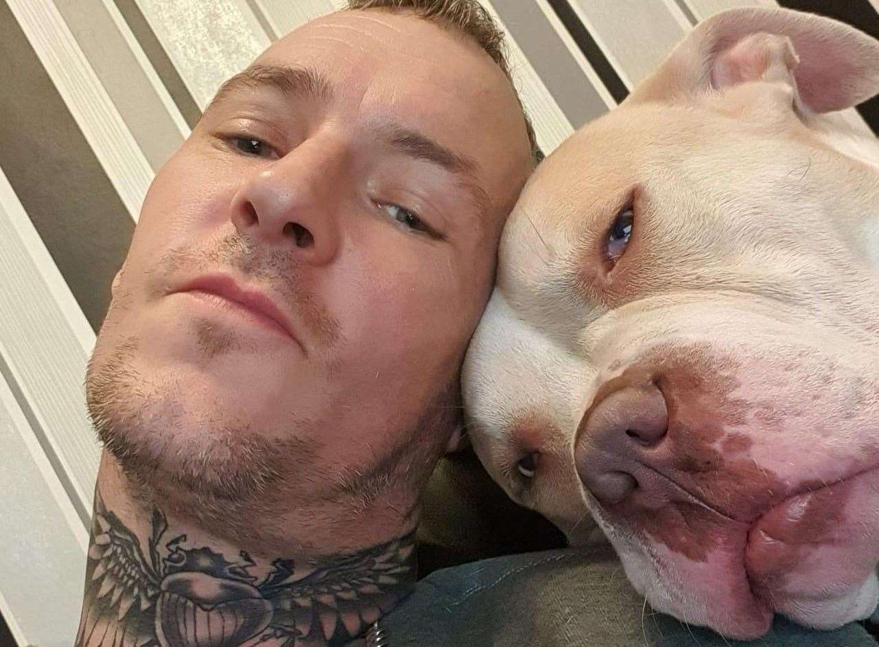 Kevin Record was saved by his dog, Shogun, but the XL Bully sadly died. Picture: Gemma Servante