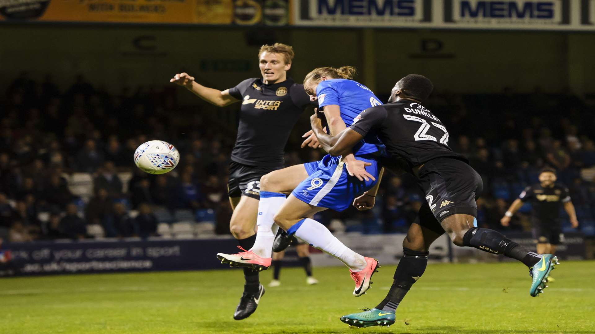 Tom Eaves heads in for Gills Picture: Andy Payton