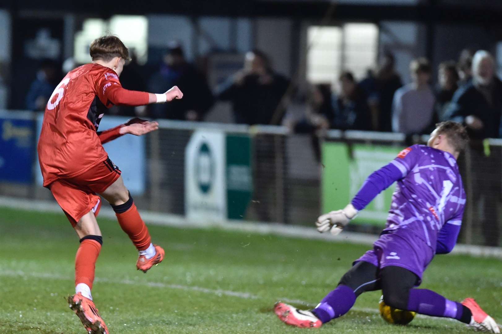 Preston Kedwell, 16, fires Ashford in front at Deal with his first goal in senior football. Picture: Ian Scammell