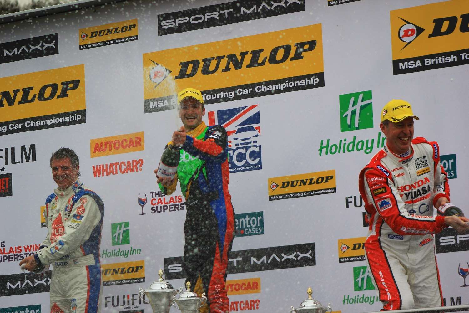 Race three winner Turkington with Plato and Neal. Picture - Joe Wright