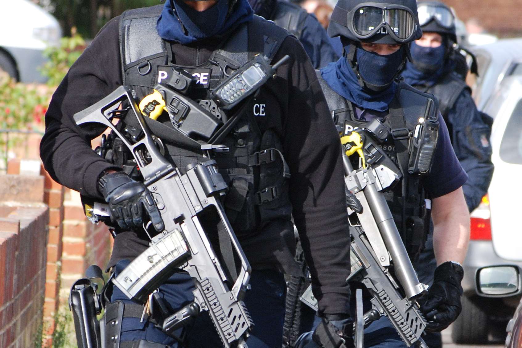 Armed police surrounded a taxi. Stock picture.