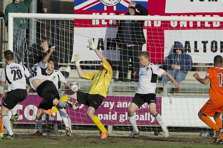 Desperate defending from Dartford Picture: Andy Payton