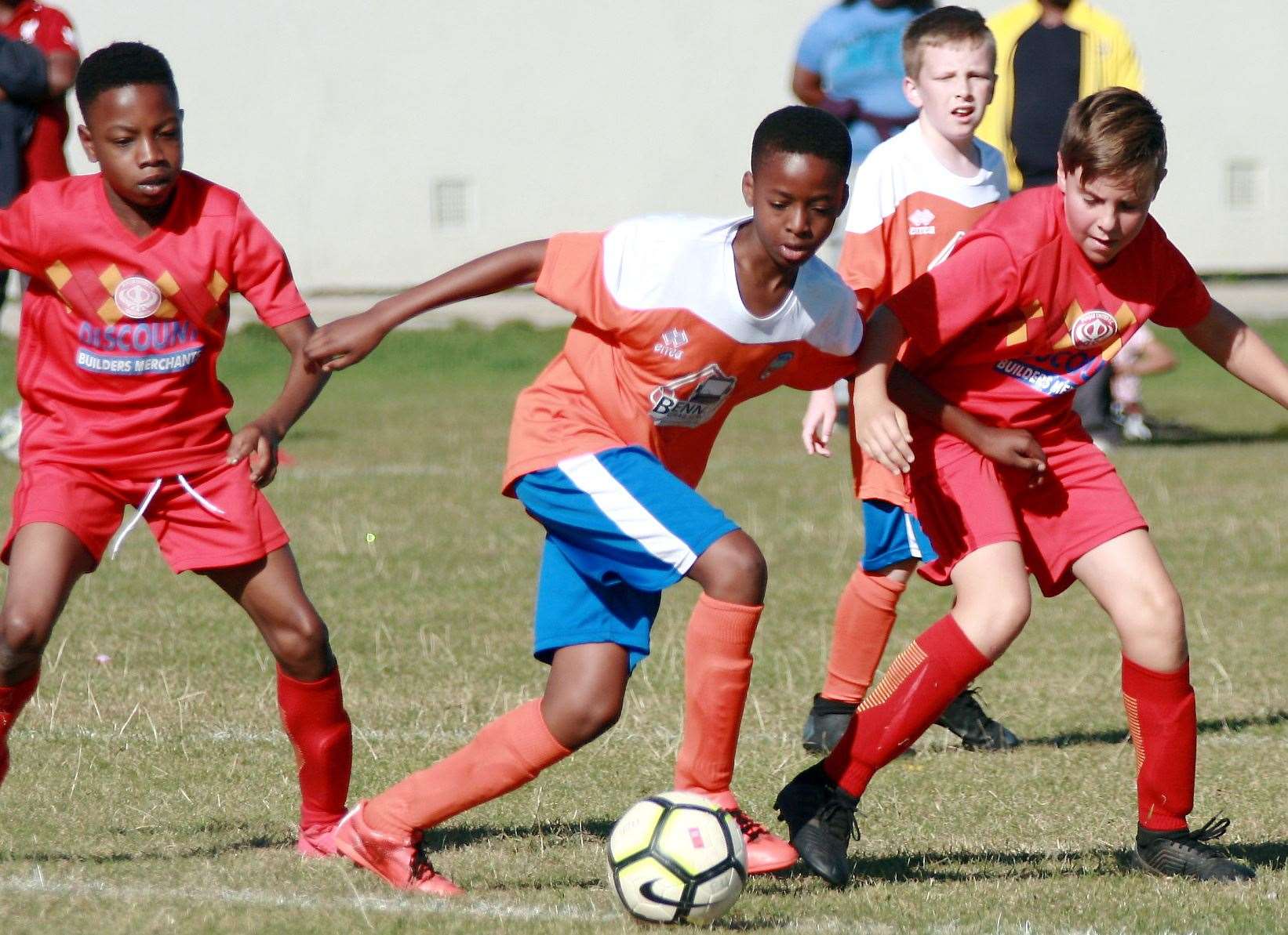 Punjab United (red) battle Cuxton 91 Crusaders in Under-12 Division 1 Picture: Phil Lee