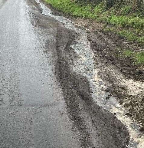 In cold weather the water is said to have turned the road into an 'ice rink'. Picture: Phillip Joiner