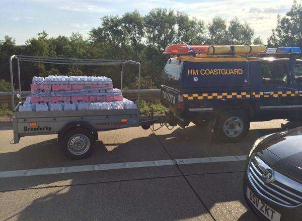 Water is taken to the truckers. Picture: @kentpoliceroads