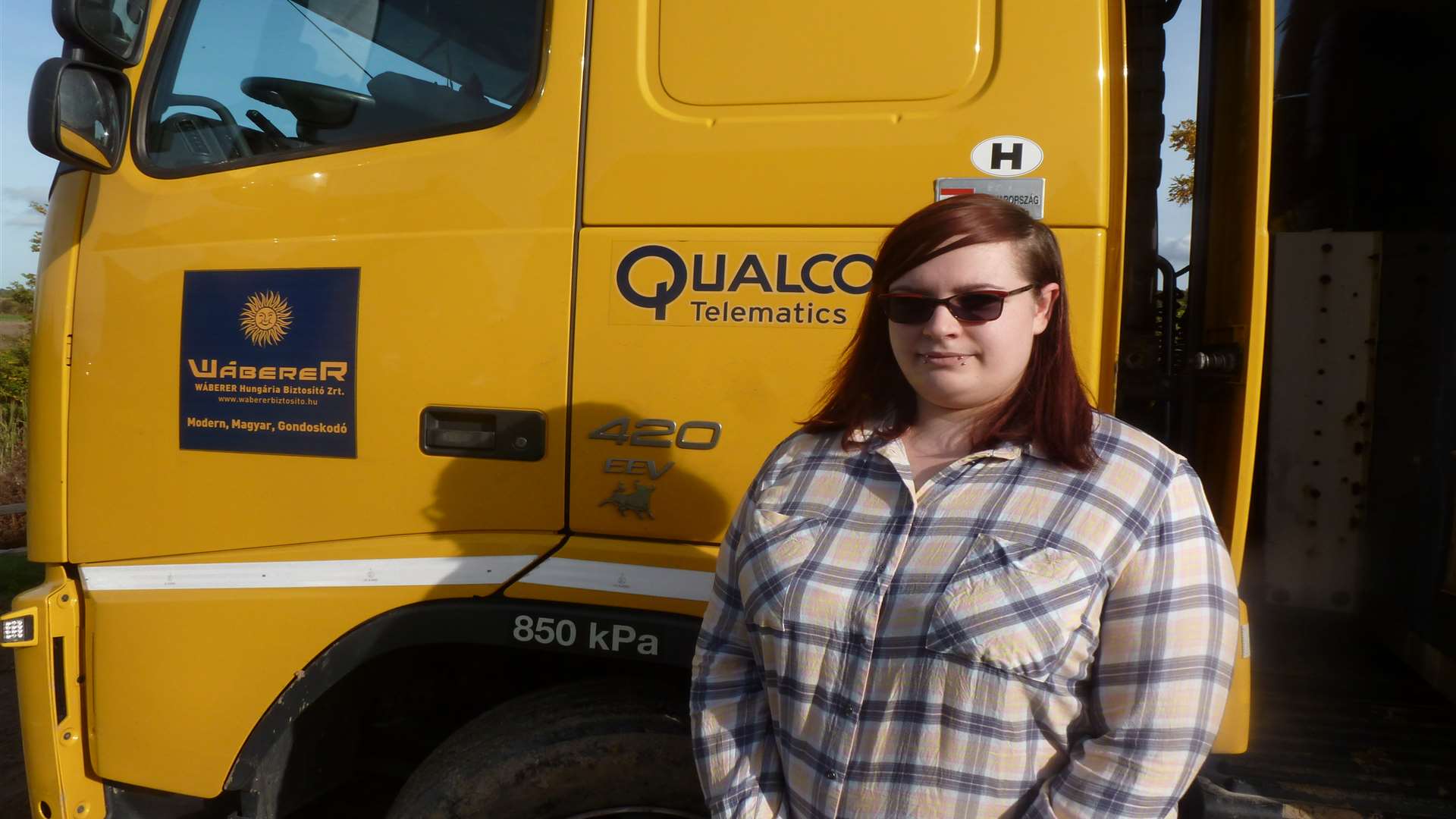 Damara Way resident Laura Morgan by the stuck lorry