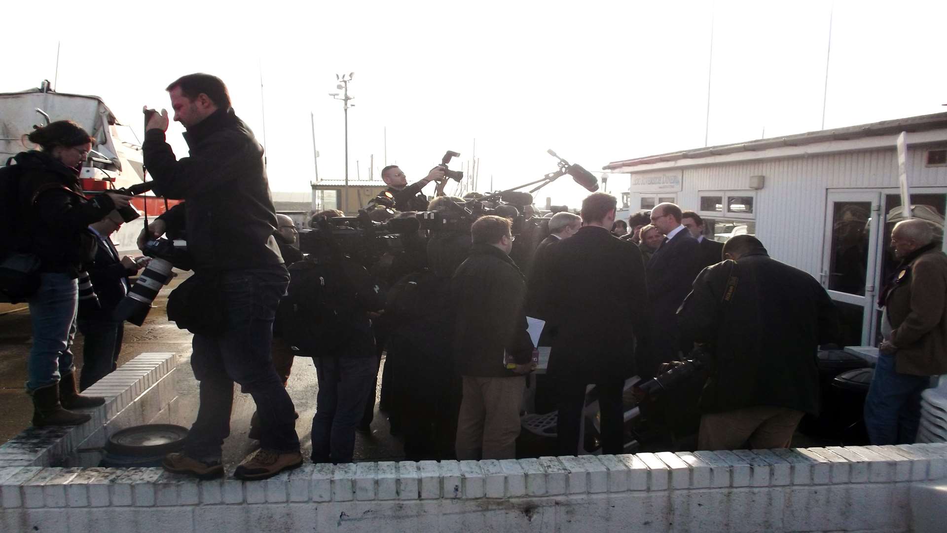 The media scrum at Hoo Marina Park