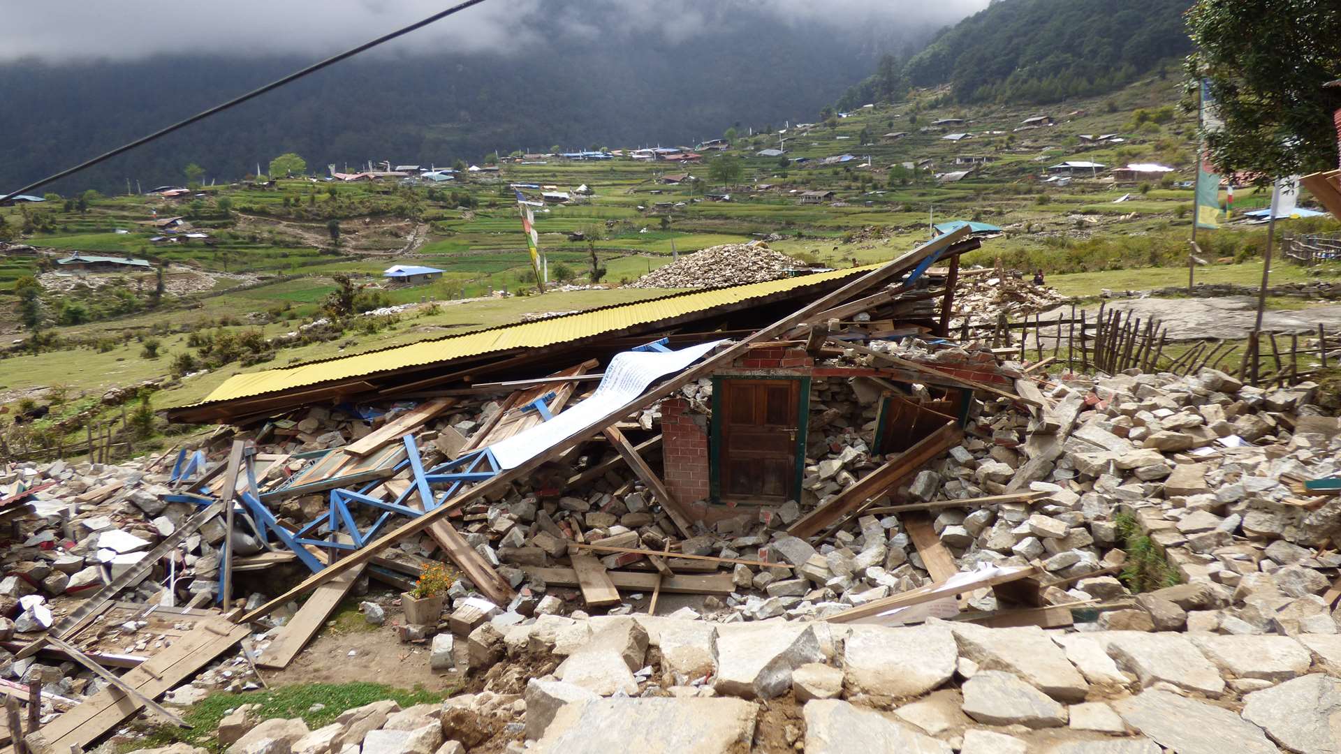 Damage to the village's school library. Image from Corin Hardcastle