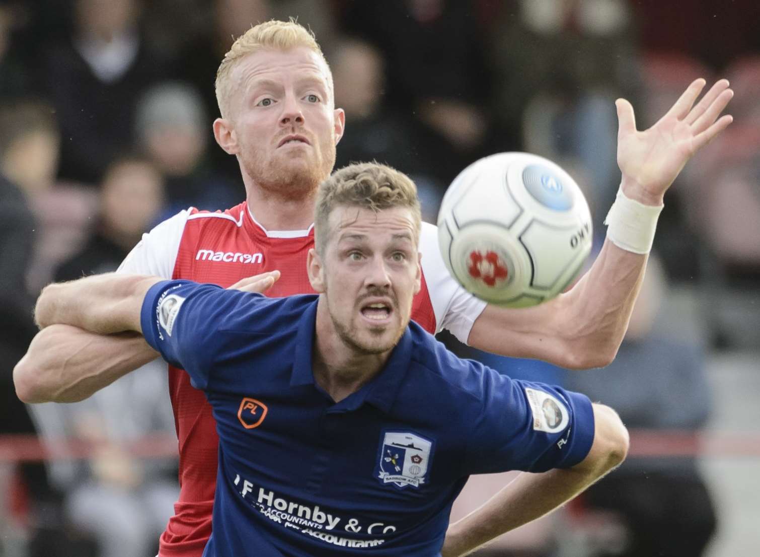 Kenny Clark in action against Barrow Picture: Andy Payton