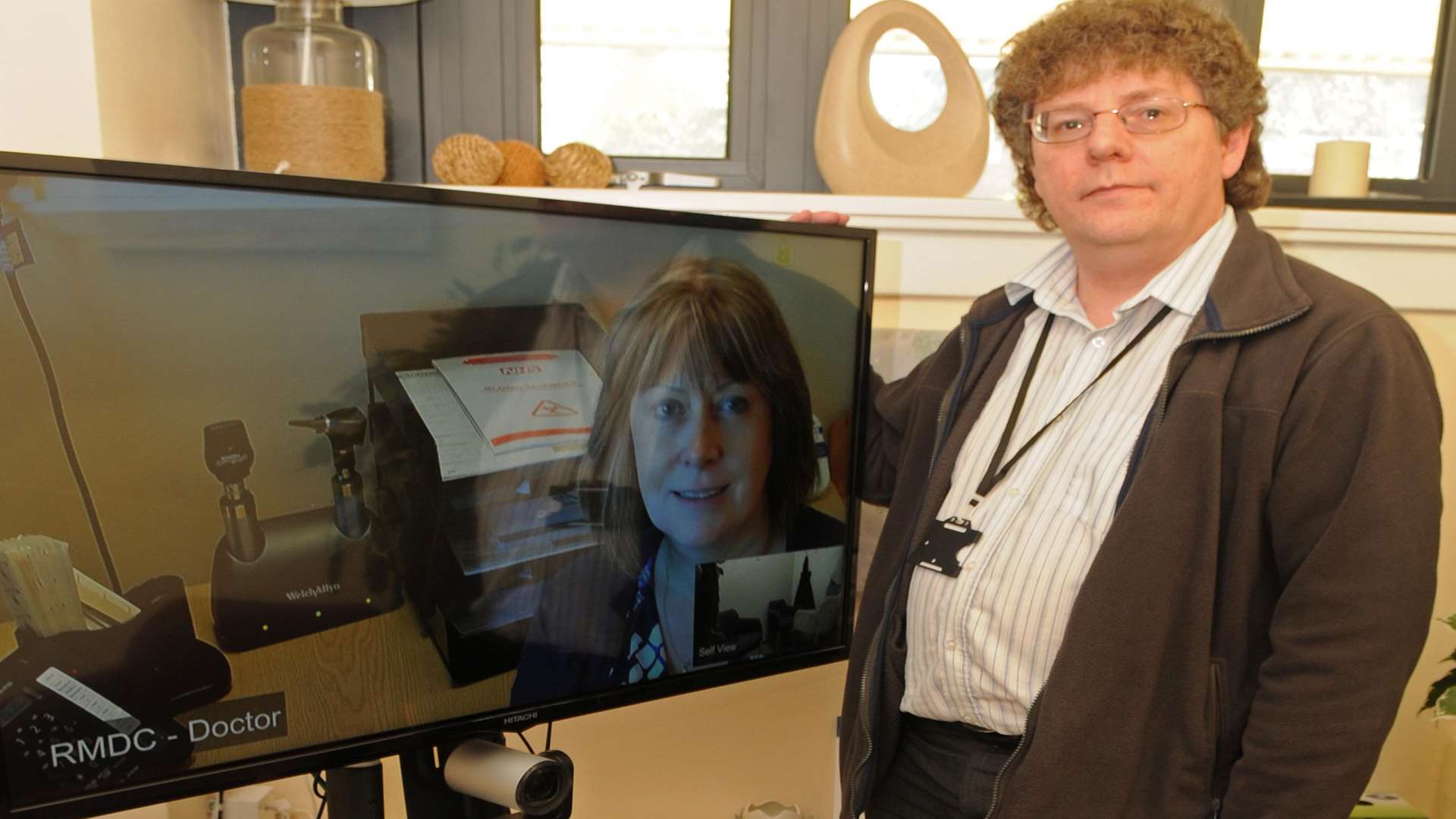 Nurse Jenny Bostock on tv with Mike Deal at Romney Marsh Day Centre. Picture: Wayne McCabe