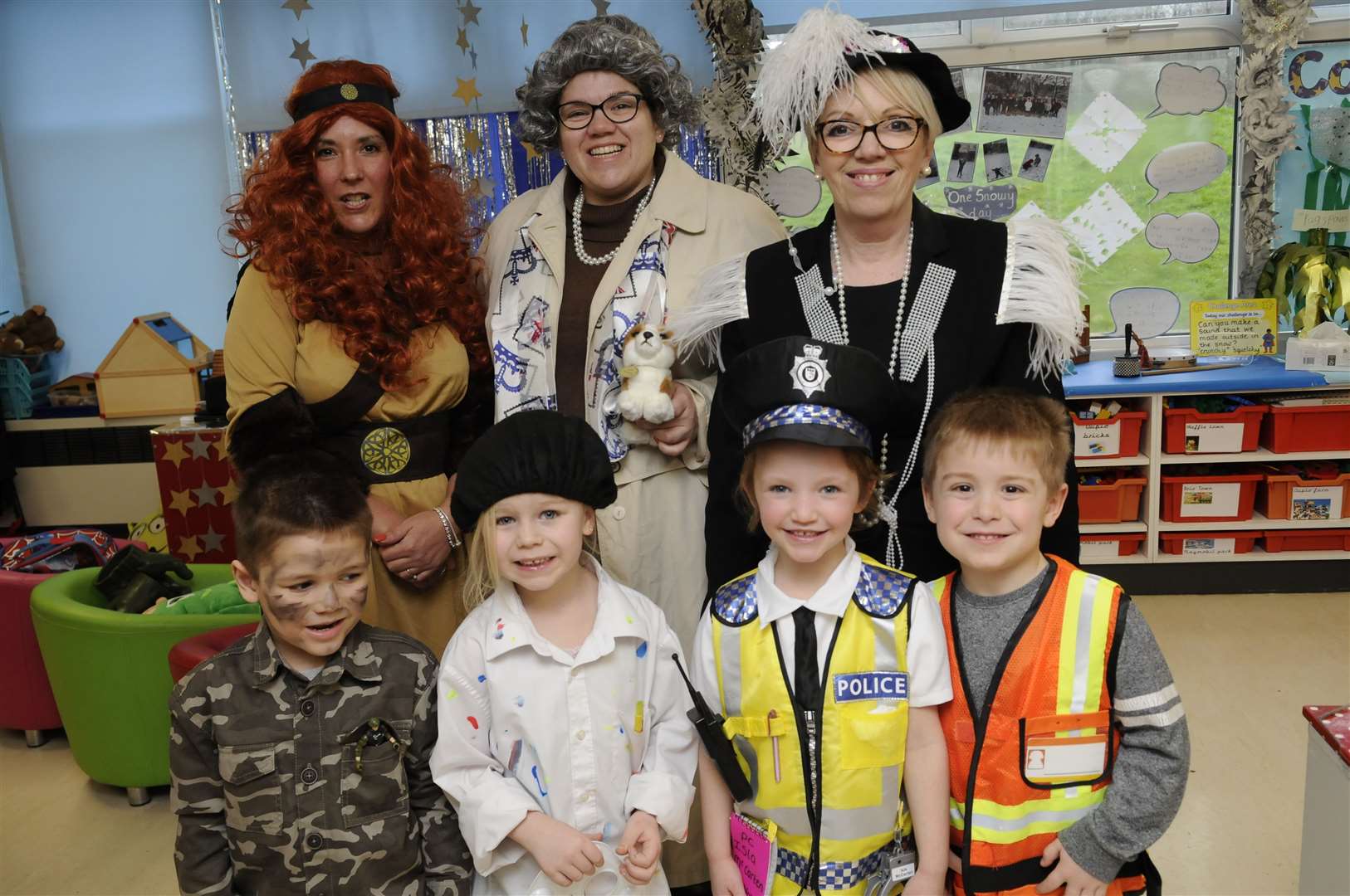 Karen Marco, top right, pictured with staff and pupils at Swingate's history day in 2018