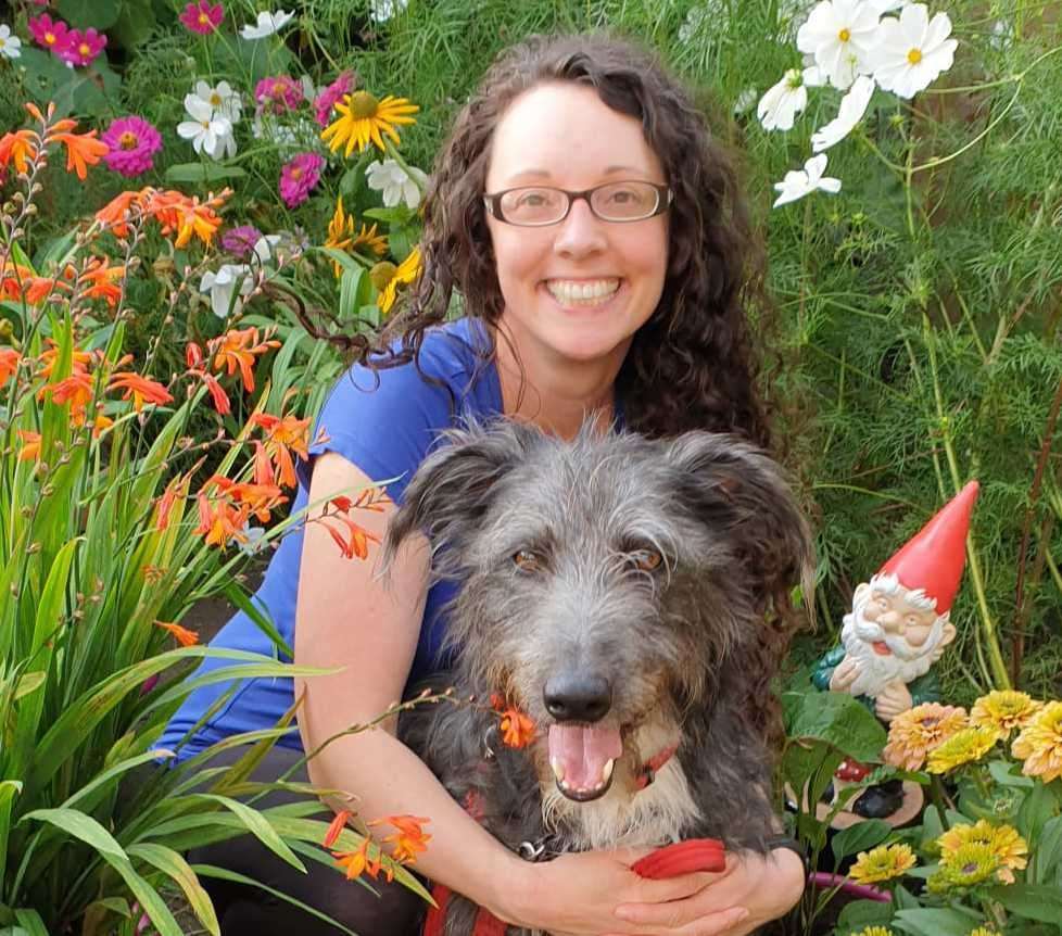 Becky with the family's pet dog Teddy