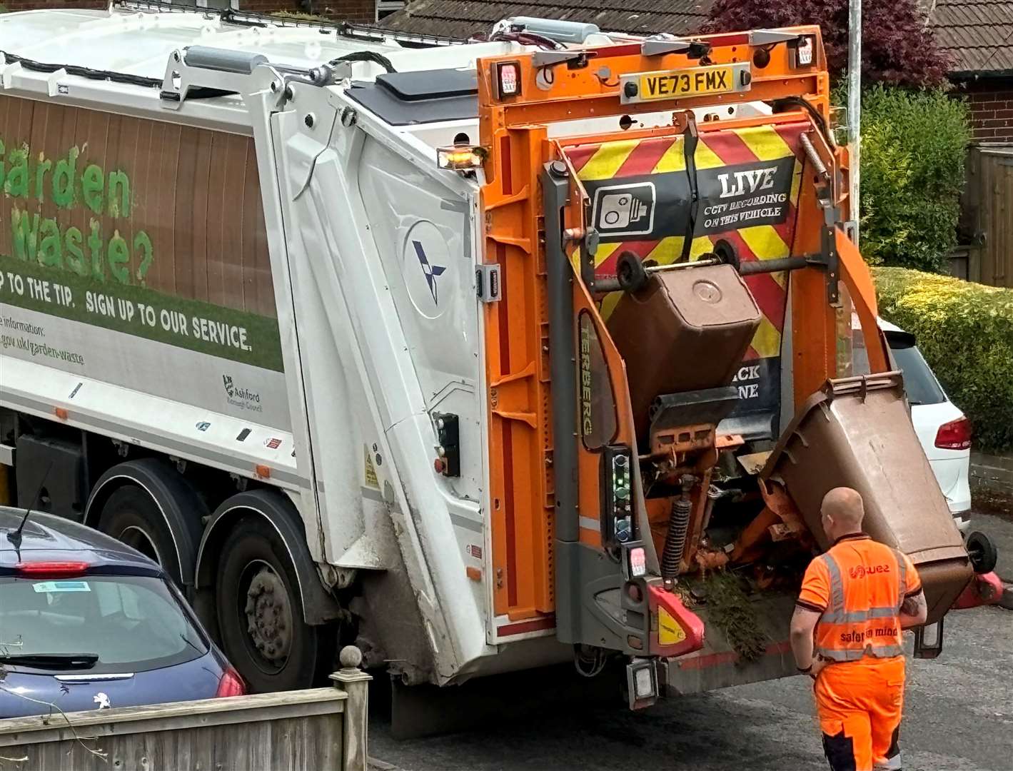 Suez workers collecting garden waste in Willesborough this week