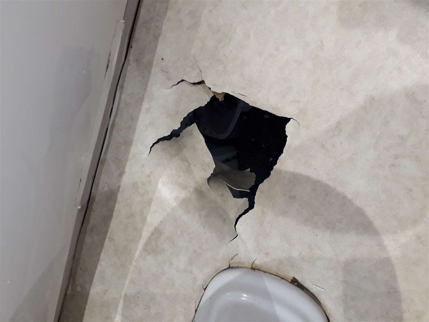 Floorboards collapse in bathroom