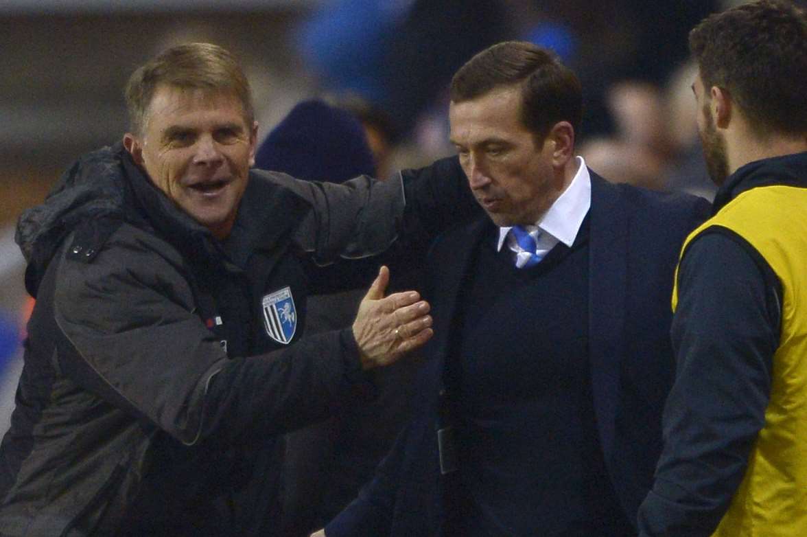 Andy Hessenthaler and Justin Edinburgh celebrate victory at Peterborough last season