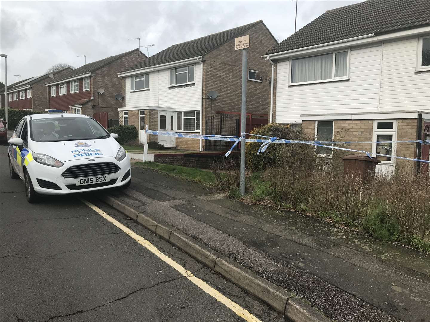 A police car and cordon in Birch Grove, Hempstead, after the woman's body was discovered